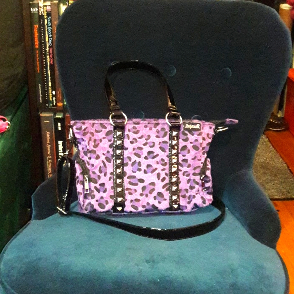Sourpuss purple leopard purse